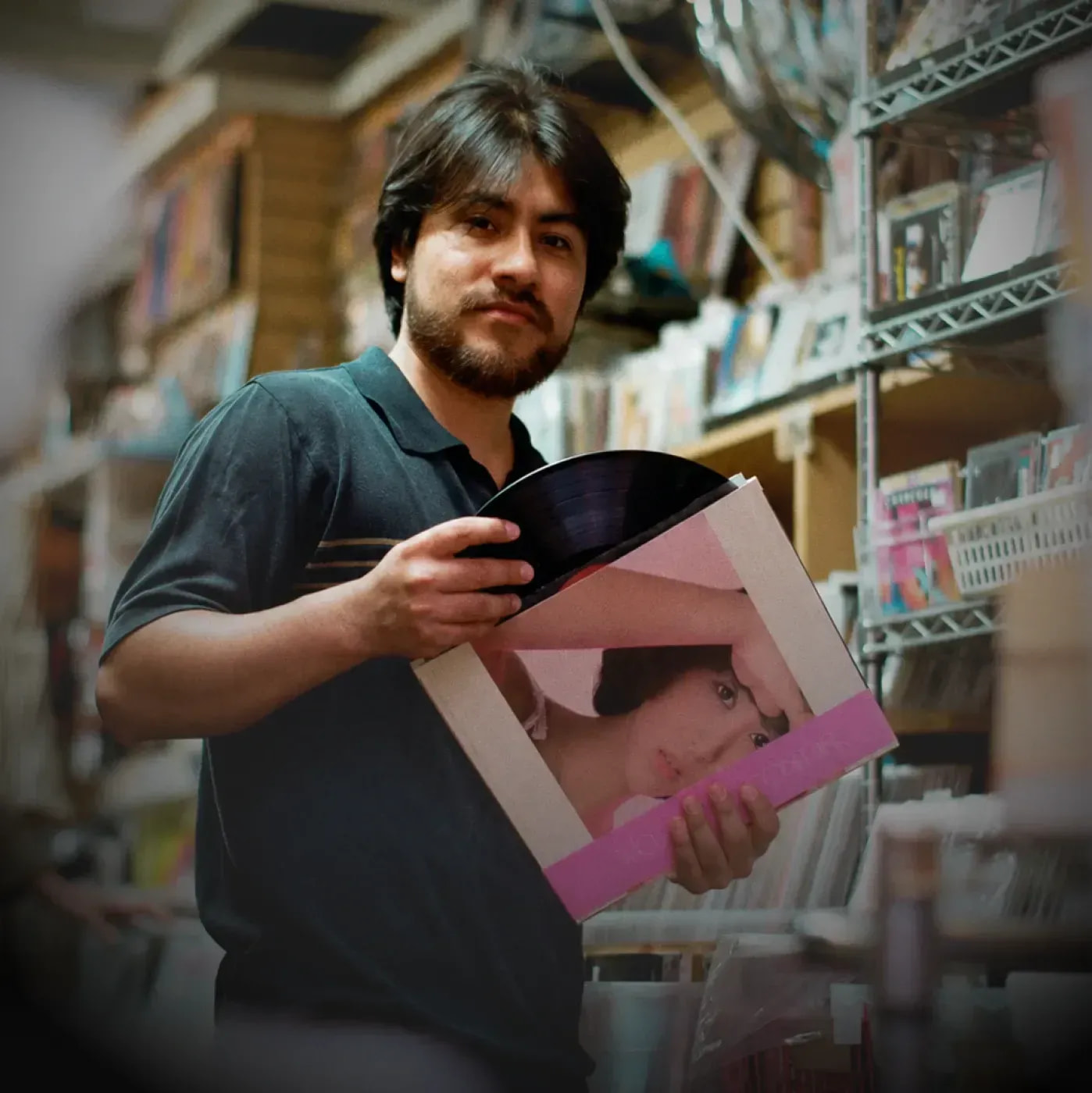Portrait of Mauri Tapia of Los Retros in a white Pro Club tank top