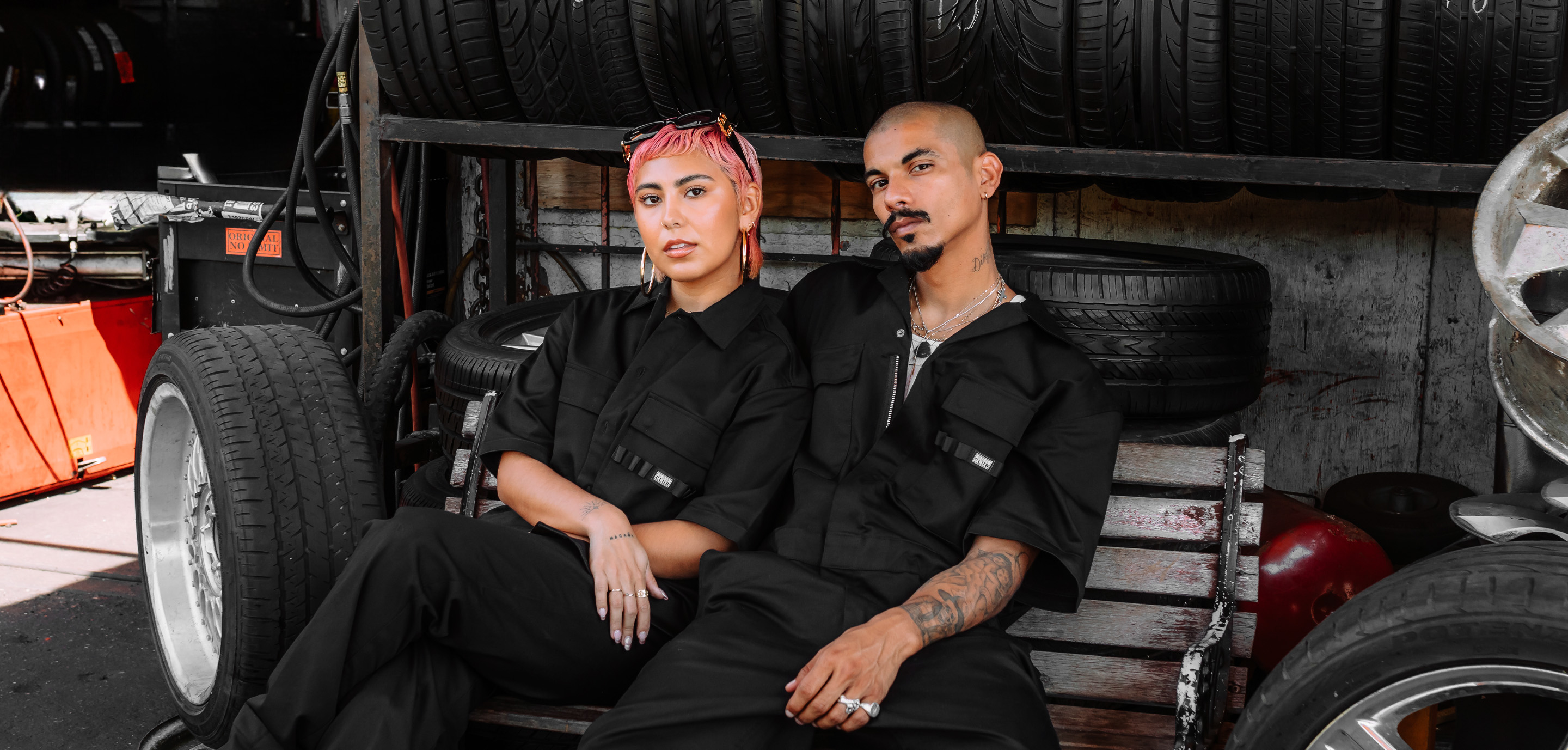 couple in proclub black workwear