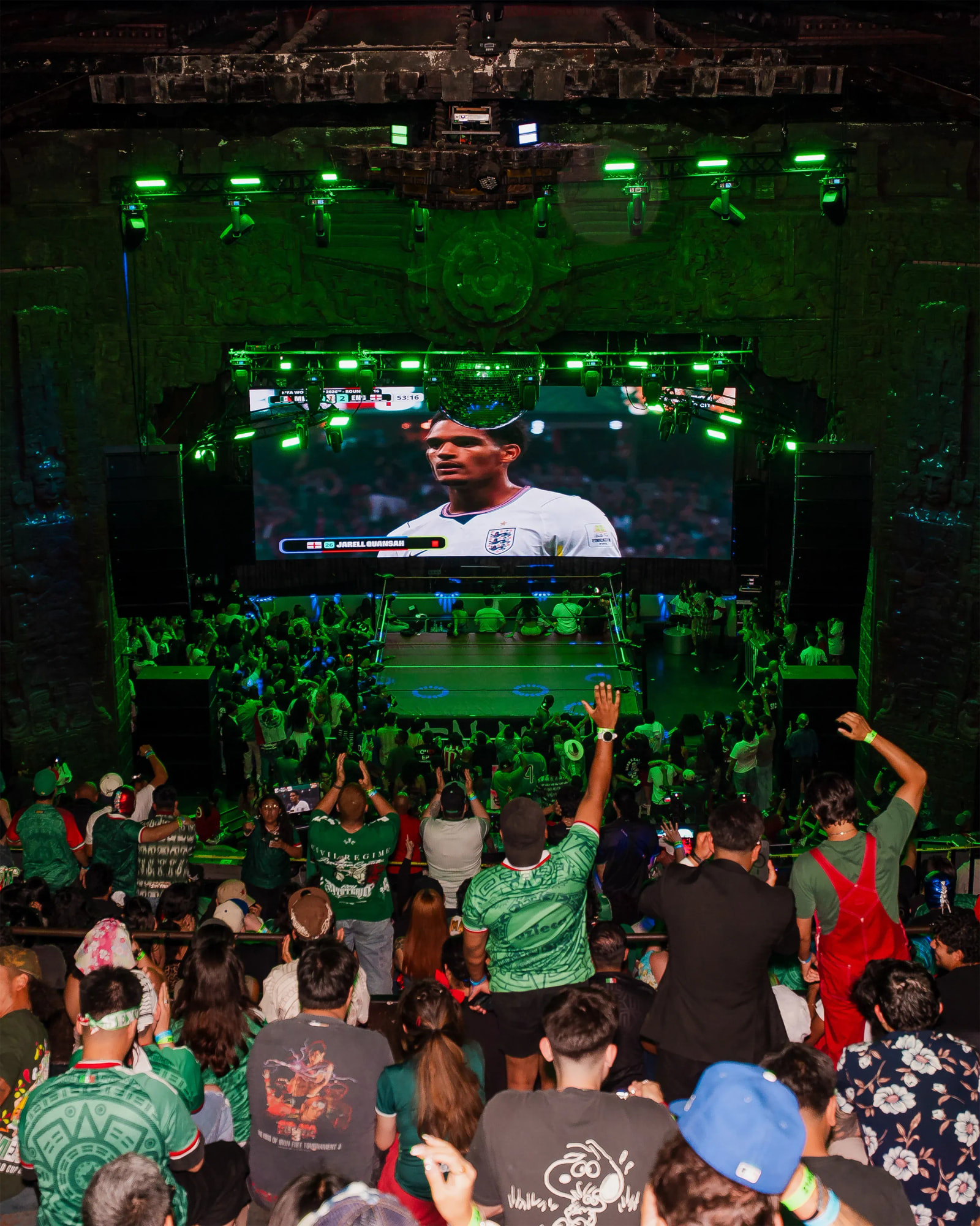 a crowd of people watching MFN