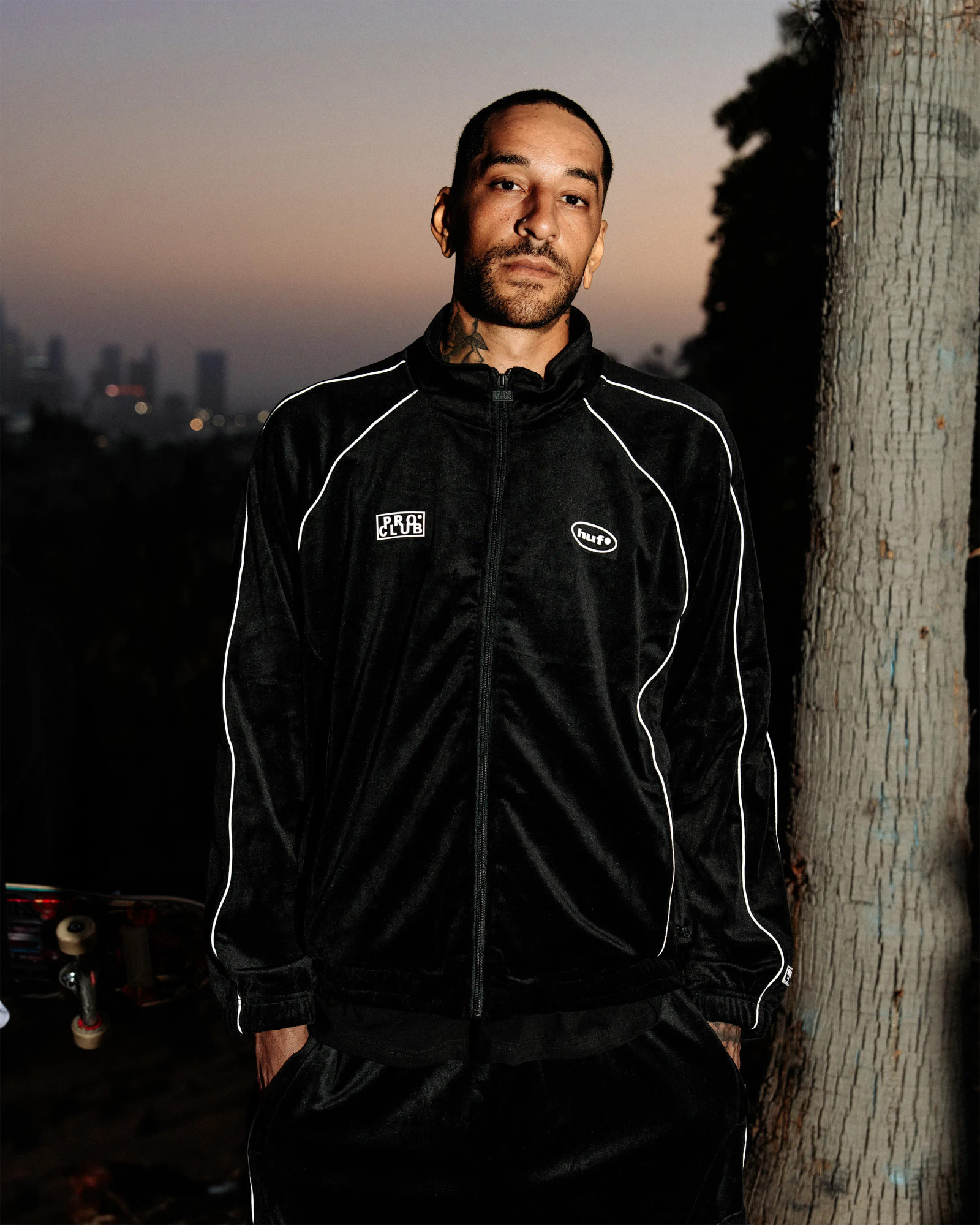 men in huf black jacket