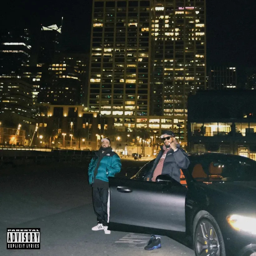 Two men in Pro Club jackets by a car at night on the 2P’z In A Pod cover
