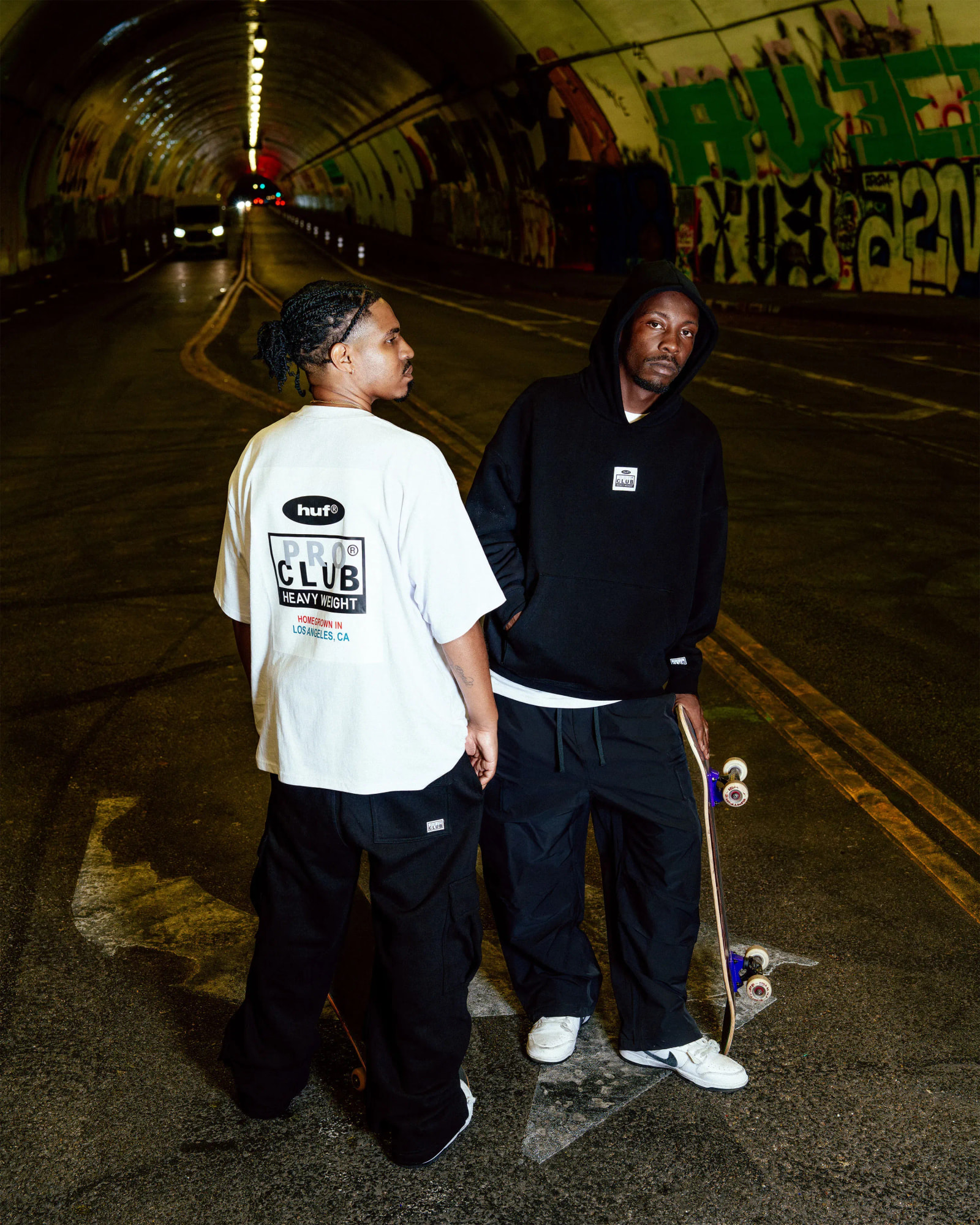 two men in proclub X HUF tee & pant